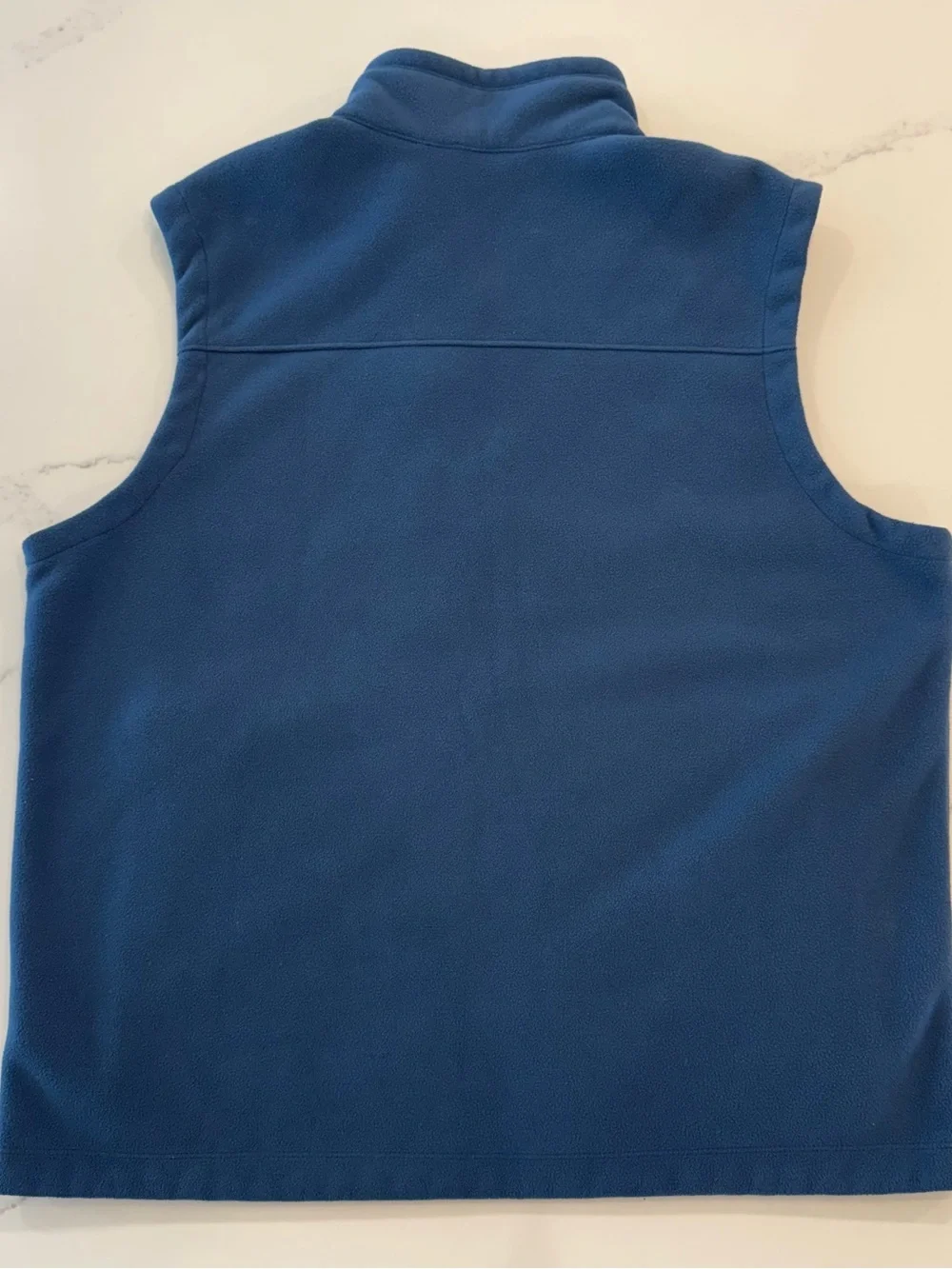 The North Face Blue Men’s Fleece Vest with Navy Chest Panel